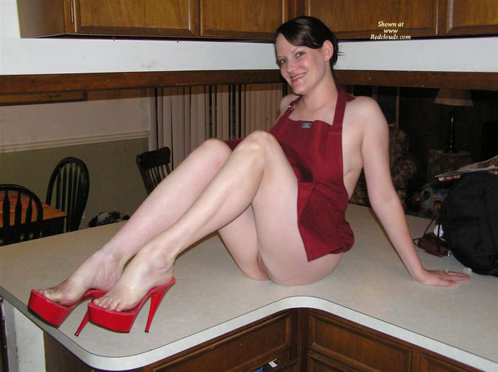 Pic #1Leggy Elena In The Kitchen